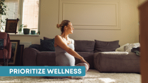 A pregnant woman meditates in her living room, focusing on prenatal mindfulness.
